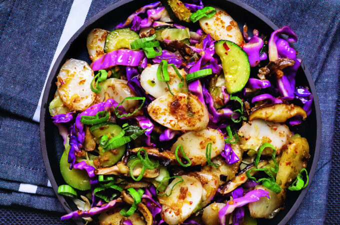 cookbook photo of homemade xo sauce rice cakes in an iron skillet