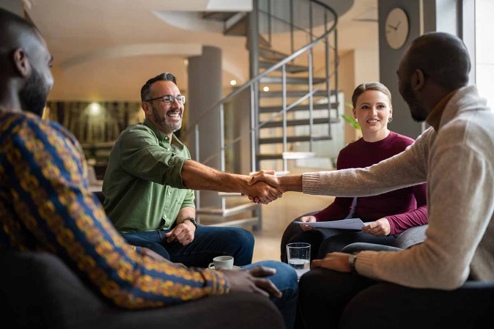 Man-shaking-hands-branded-content-at-edible-manhattan-1020x680